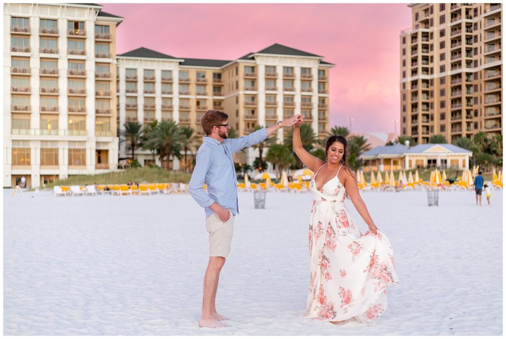Sunset at Sandpearl Resort destination wedding in Clearwater, Florida with Kourtney Kaiser Photography bride and groom on the beach.