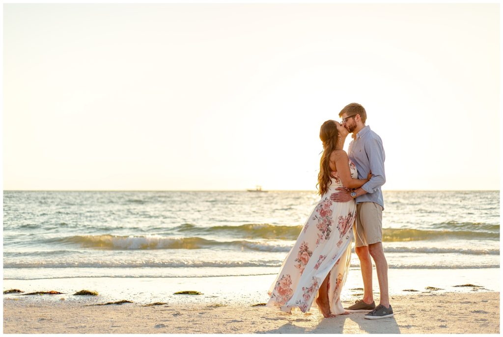 Intimate moment on beach with bride and groom in Clearwater, Florida Sandpearl Resort.