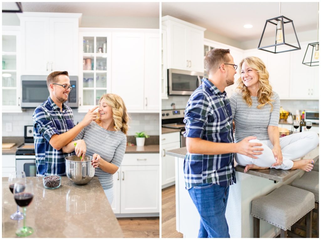 Photo on left of husband puting cookie dough on wife's nose as she mixes the dough in a beautiful white DIY kitchen and right photo of couple smiling each other while wife sit on kitchen island in Tampa, Florida.